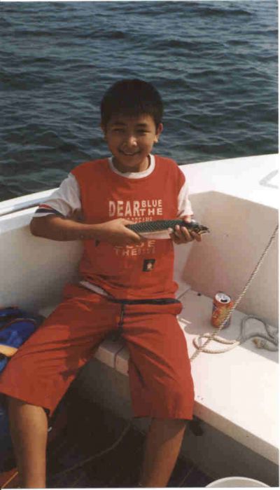 July 2002. Fishing outside GÃ¶teborg. 1 fish for me. 3 for "pappa"
