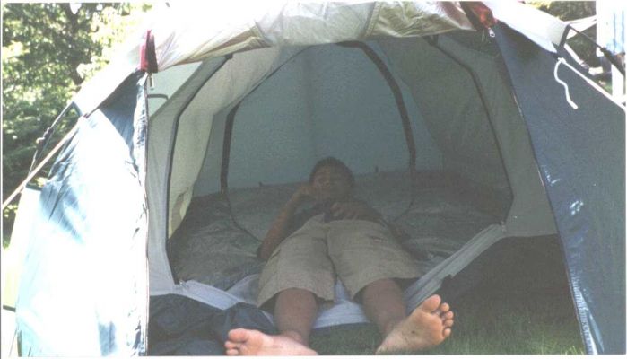 July 2002. Me in a tent.
